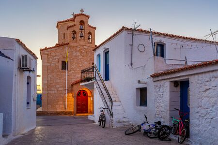 Church in the main square of Megalochori village on Agistri island in Greece.の写真素材