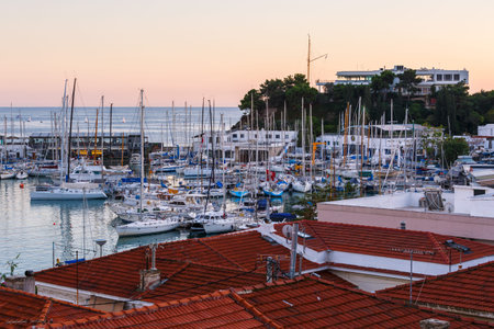 Athens, Greece - November 15, 2019: Sail boats at the yacht club in Mikrolimano marina in Piraeus,...