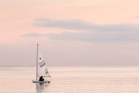 Athens, Greece - December 6, 2019: Student of a sailing school in Mikrolimano marina in Piraeus, Athens.のeditorial素材