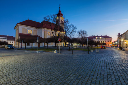 Rimavska Sobota, Slovakia - March 3, 2019: Classicistic Roman Catholic church in the town of Rimavska Sobota, Slovakia.のeditorial素材