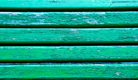 Green striped old wooden bench backgroundの写真素材