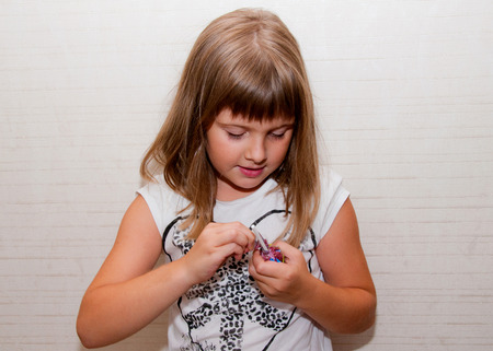 Teen girl opens candyの写真素材