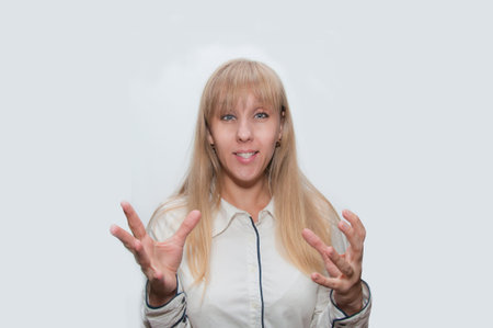 Young blond woman shockedの写真素材