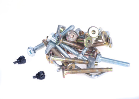 Mount the old bolts, screws, nails on a white backgroundの写真素材