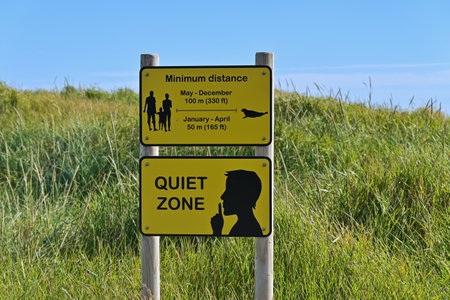 A warning sign warning visitors not to disturb the seals on the beach Ytri Tunga on Snaefellsnes Peninsula, Icelandの写真素材
