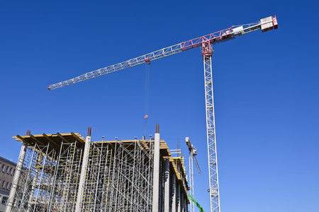 Low angle view of the crane on the construction site