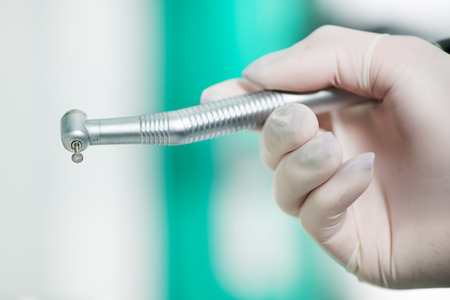 Dentist holding dental drill  Close-Upの写真素材