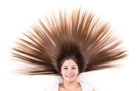 Cute young girl with Beautiful healthy shiny hair.の写真素材