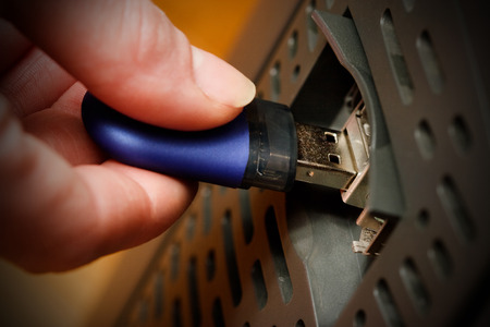 Copying data from a flash drive to a computerの写真素材