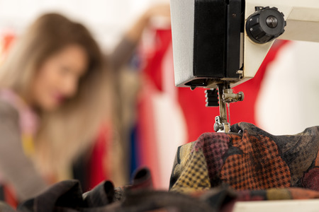 Close-up of a sewing machine with a material that sew.の写真素材
