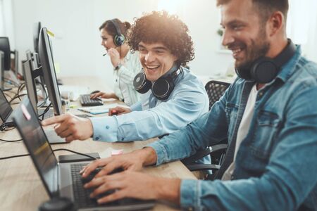 Young successful business people working together in the casual office.の写真素材