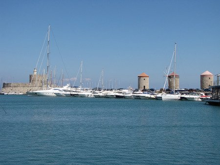 three old tower in Mandraki harbor photography twoのeditorial素材