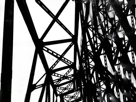 Abstract deconstruction architecture black and white manipulated photo of bridge metal construction looking like it made from film. Geometry art photo. City Escapes.の写真素材