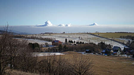 Coal power plants making smog situation in valley, mountain panoramic view of Ore Mountains, Czech...
