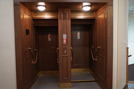 Traditional paternoster lift elevator that running in loop without stopping, curiosity in Prague, Czech Republicの写真素材