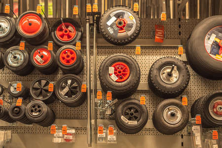 Sale of car wheels in the store at the stand. Shop premises. Retail.の写真素材