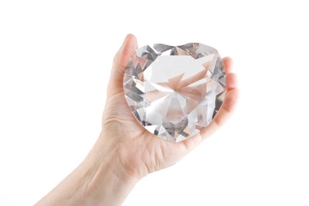 Crystal heart in the male palmの写真素材