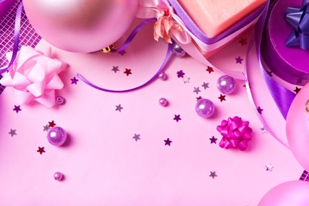 New Year's decor with a cofetti and letter paper in violet tones (top horizontal view)の写真素材