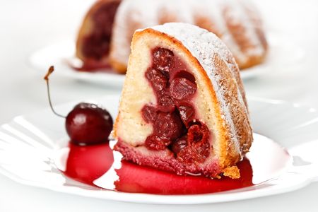 Sweet cherry pie on the white plateの写真素材