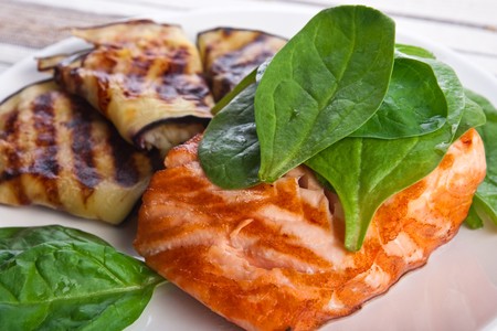 Fish-grill steak with eggplant and spinachの写真素材