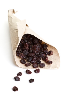 Raisins, wrapped in paper on a white backgroundの写真素材