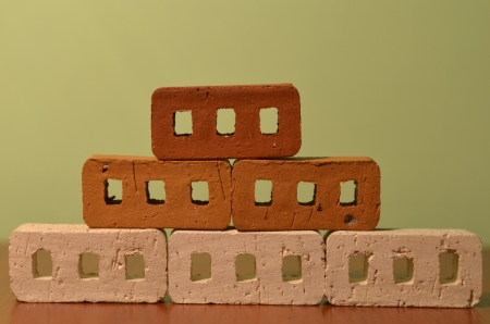 white, yellow and orange blocks on the green background