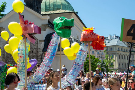 Cracow, Malopolska, Poland - 04.06.2023: The animated dragon marching during the Dragons Parade, the...