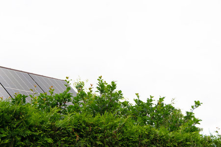 Installing a Solar Cell on a Roof. Solar panels on roof. Historic farm house with modern solar...
