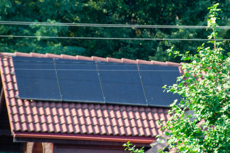 Solar power energy on the roof to a standard house. Solar power panels ,Photovoltaic modules for...