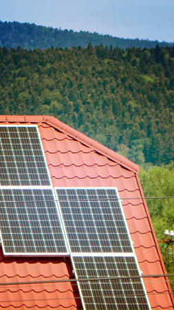 Solar power energy on the roof to a standard house. Solar power panels ,Photovoltaic modules for...