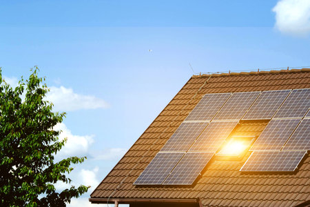 Solar power energy on the roof to a standard house. Solar power panels ,Photovoltaic modules for...