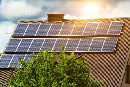 Solar power energy on the roof to a standard house. Solar power panels ,Photovoltaic modules for...