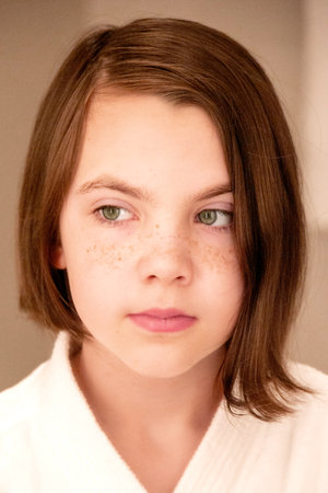 Beautiful girl in a Bathrobe posing in the interior of the room. Portrait of a cute beautiful girl...