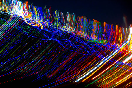 Abstract blurry background with pattern from colorful traces or trajectory of lights.Abstract...