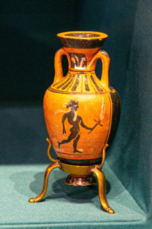 Antique ceramic decorative amphora on a white background. Clay jugs and a pot, a set of ancient utensils for drinking wine, water or milk. High quality photoの写真素材