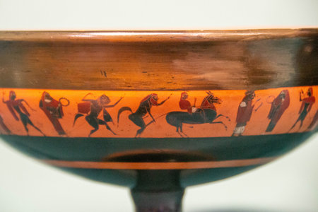 Antique ceramic decorative amphora on a white background. Clay jugs and a pot, a set of ancient utensils for drinking wine, water or milk. High quality photoの写真素材
