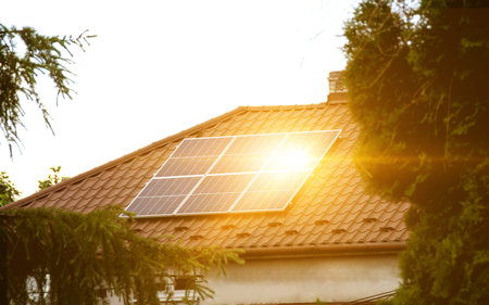 Solar power energy on the roof to a standard house. Solar power panels ,Photovoltaic modules for...