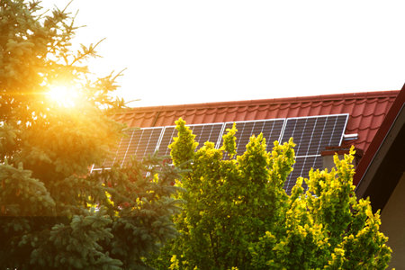 Solar power energy on the roof to a standard house. Solar power panels ,Photovoltaic modules for...