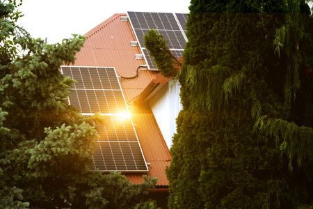 Solar power energy on the roof to a standard house. Solar power panels ,Photovoltaic modules for...