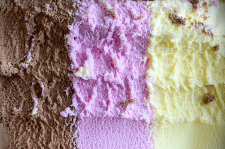 Closeup shot of an Ice cream (es krim) with three different flavor vanilla, chocolate and...