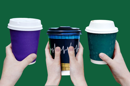 Simply flat lay design color paper coffee cup on pastel colorful trendy background. Takeaway drink container. Good morning wake up awake concept. Template of drink mockup. Top view copy spaceの写真素材
