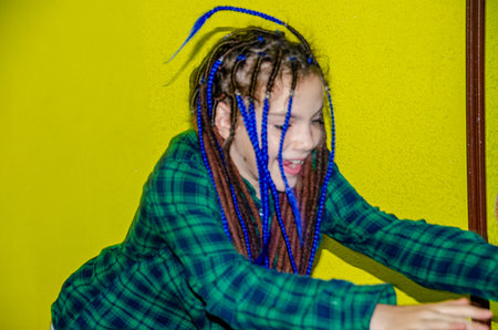 Cute young girl enjoy playing in indoor playground.Concept photo of child, childhood and girls lifestyle. Real people. Copy space. High quality photoの写真素材