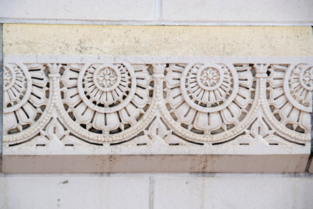 Erzurum Double Minaret Madrasa Stone Intricate Carvings and Embellishments. Decorative sandstone wall. High quality photoの写真素材