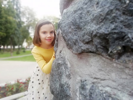 beautiful girl in the park, best focus on the face,background blurred. portrait of a beautiful...