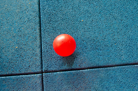 Red ball on the playground. High quality photoの写真素材