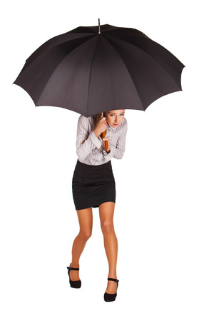 business woman holding an umbrellaの写真素材