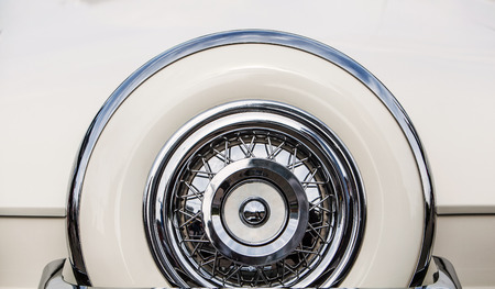 Spare Tire on an White Retro Car