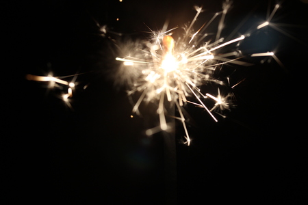 Christmas colorful sparklers holiday background for xmas new yearの写真素材