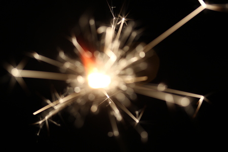 Christmas colorful sparklers holiday background for xmas new yearの写真素材