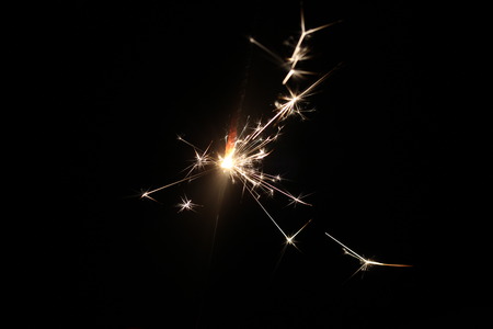 Christmas colorful sparklers holiday background for xmas new yearの写真素材